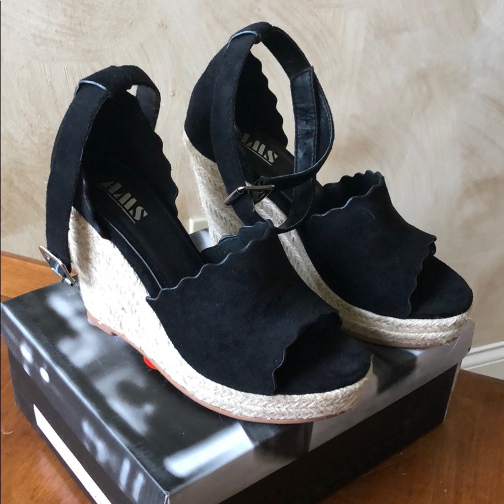 NEVER WORN. Wrap around ankle wedge